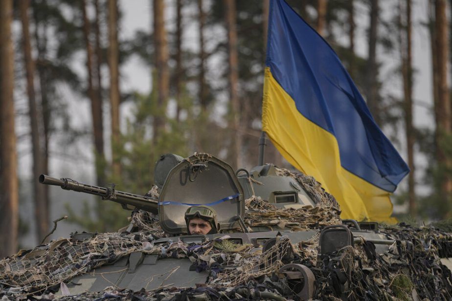 Tank with Ukraine Flag flying above it