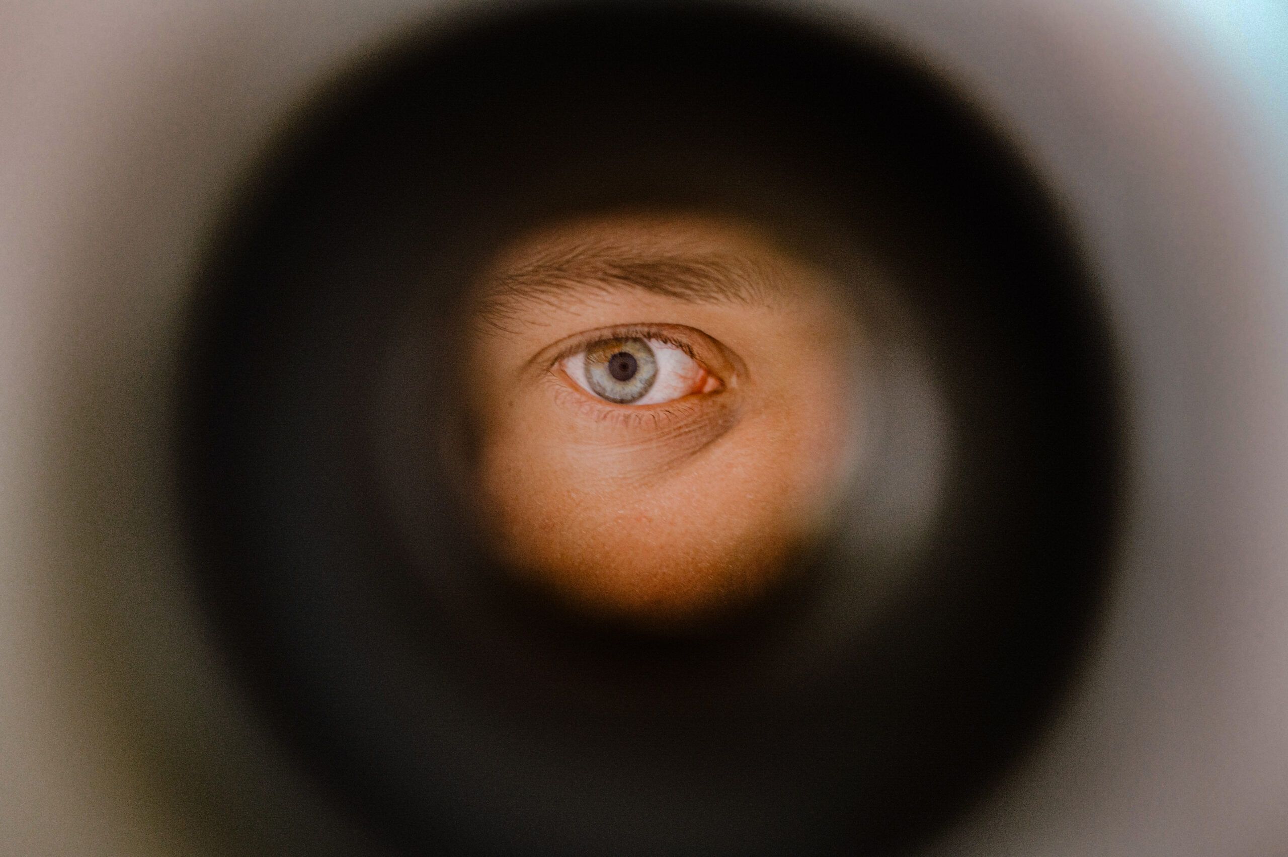 Eye Looking through a peephole