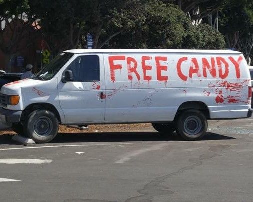 white van with "free candy" written on it