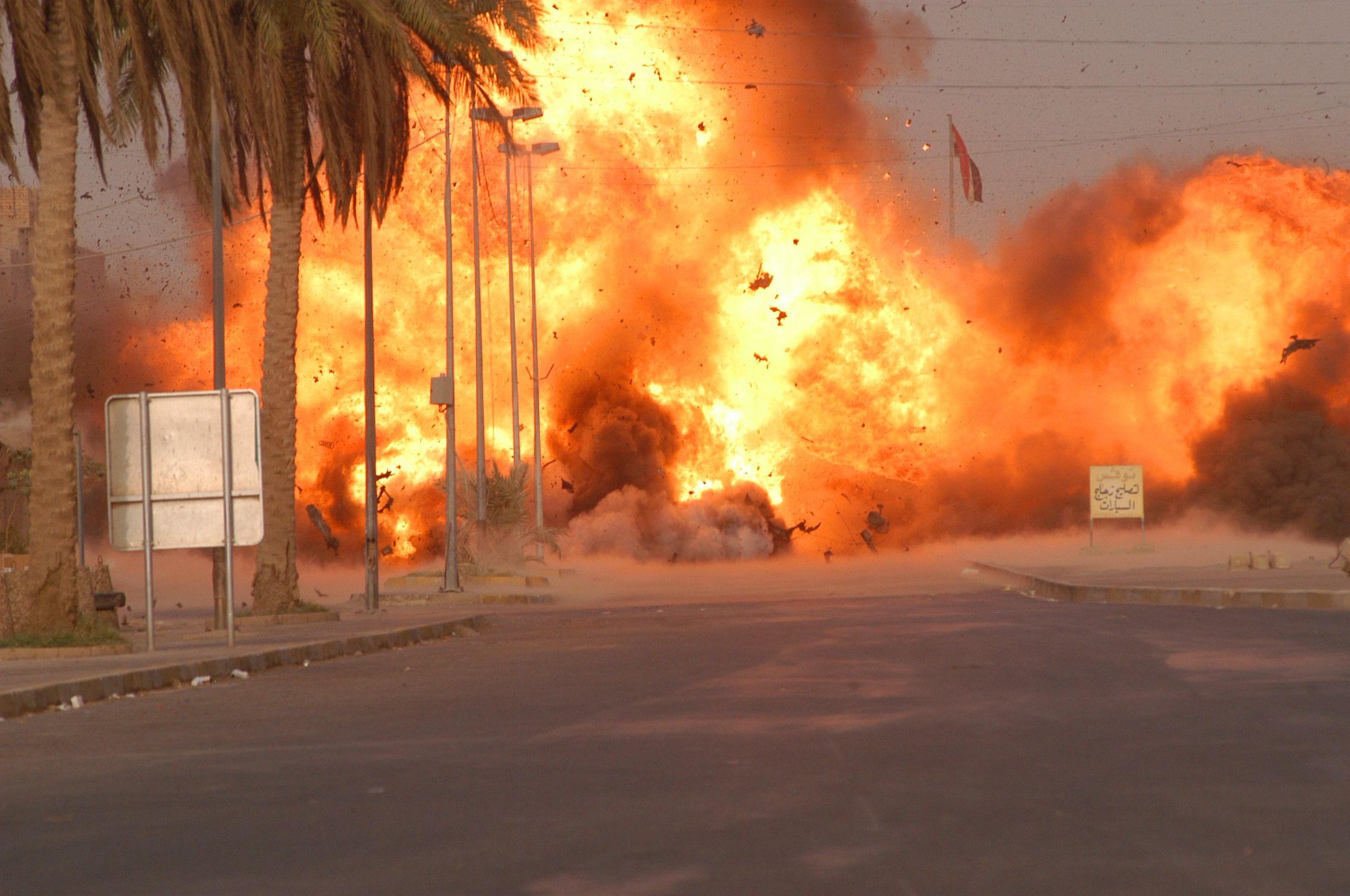 A vehicle borne improvised explosive device is detonated a firey explosion of a vehicle borne improvised explosive device
