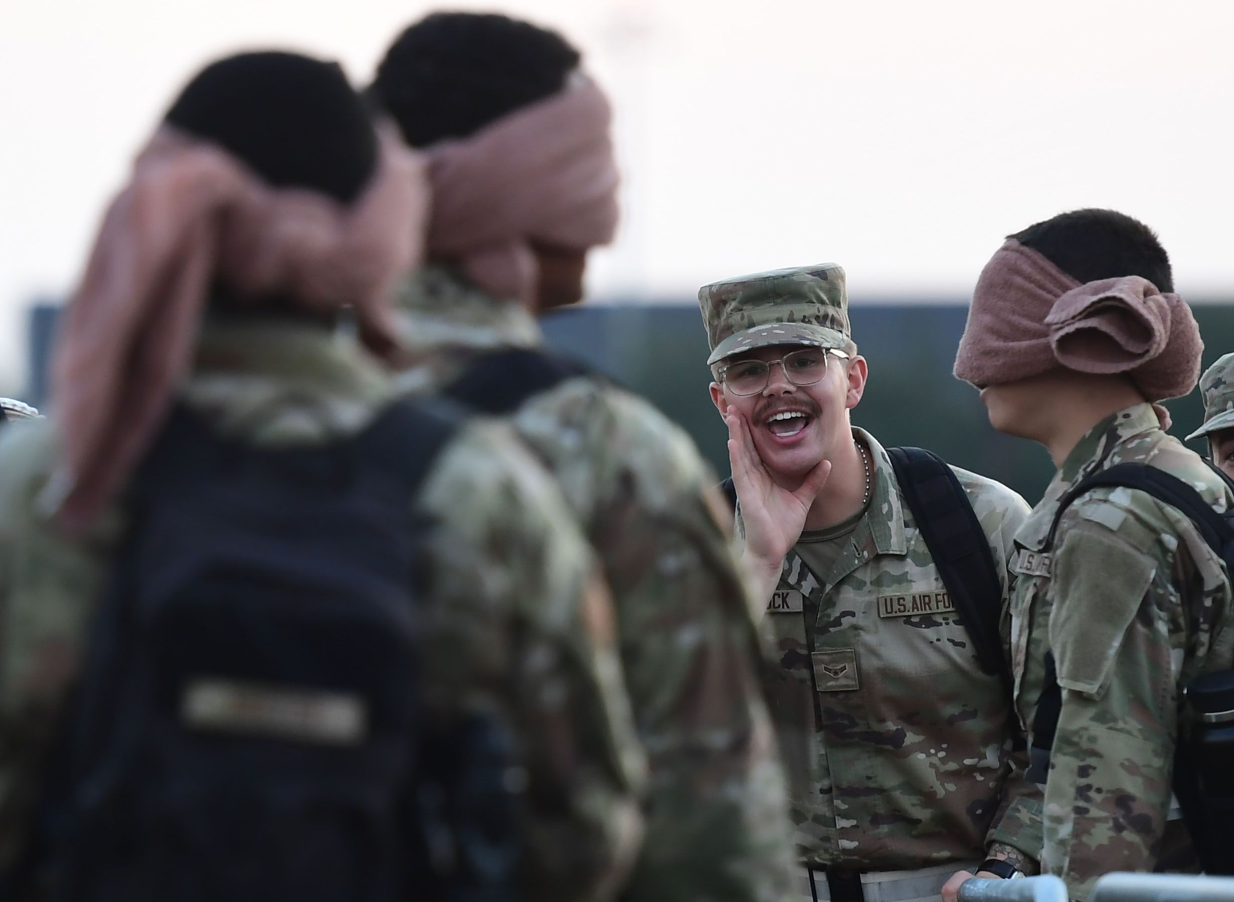 a clip from the movie Clear and Present Danger, the search team locates where the sniper ate his lunch. They hold up a wrapper from a fast food resturant.